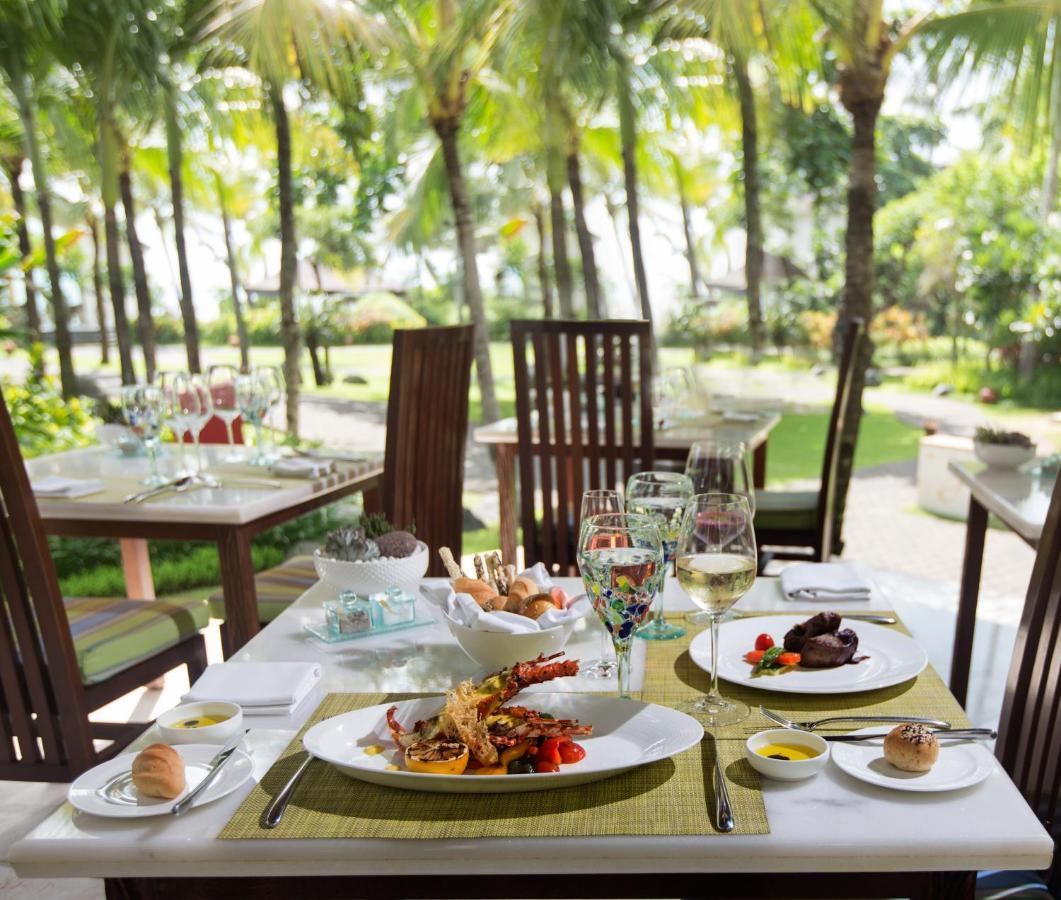 The Seminyak Beach Resort & Spa Εξωτερικό φωτογραφία A table set for fine dining